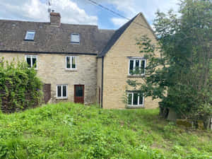 Bright Sunlit Living Room With Modern Comfort Wallpaper