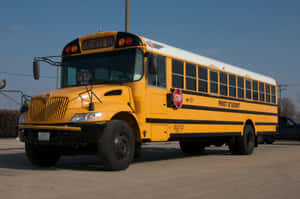 Bright Sunny Day With A Classic Yellow School Bus Wallpaper