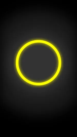 Bright, Vibrant Yellow Neon Light In A Dark Space Wallpaper