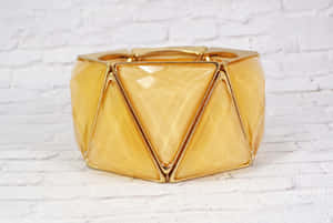 Bright Yellow Triangle On Abstract Gradient Background Wallpaper