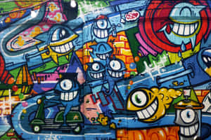 Brightly Colored Graffiti Brightens Up A City Street Wallpaper