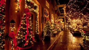 Brightly Lit Alley In Festive Christmas Lights Wallpaper