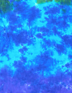 Bring A Splash Of Color With Vibrant Blue Tie Dye Wallpaper