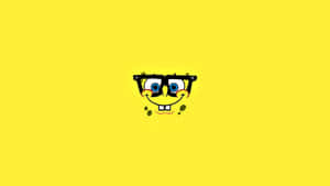 Bring Some Fun To Your Day With This Cheerful Spongebob Face Wallpaper! Wallpaper