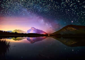 Bring The Beauty Of The Stars To Your Wall With This Majestic Night Sky. Wallpaper