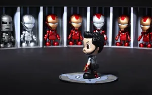 Bring The Marvel Cinematic Universe To Life With Iron Man Action Figures Wallpaper