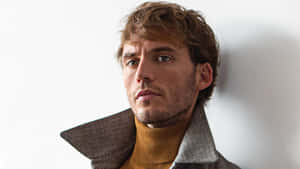 British Actor Sam Claflin In A Candid Moment Wallpaper