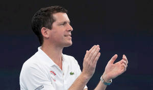 British Tennis Legend Tim Henman Captivating The Crowd Wallpaper