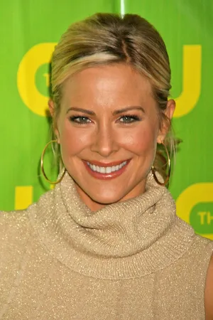 Brittany Daniel Posing Elegantly In A Stunning White Outfit Wallpaper