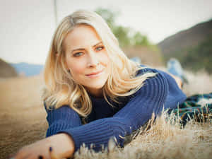 Brittany Daniel Posing Elegantly In A Stylish Outfit Wallpaper