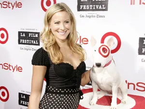 Brittany Daniel Posing Gracefully During A Photoshoot Wallpaper