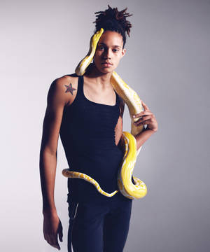 Brittney Griner Holding Snake Wallpaper