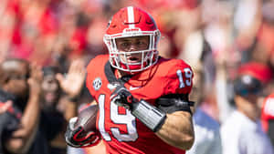 Brock Bowers Georgia Football Action Wallpaper