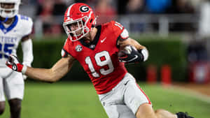 Brock Bowers Georgia Football Action Wallpaper