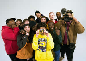 Brockhampton Poses Together In Creative Outfits Wallpaper