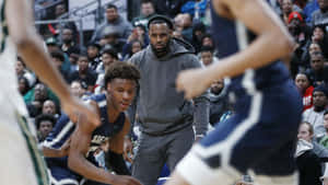 Bronny James And Lebron James Stolen Shot Wallpaper