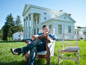 Bronson Pinchot Poses For A Portrait Wallpaper