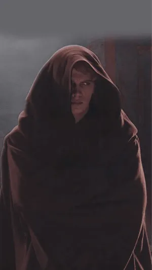 Brooding Figurein Brown Cloak Wallpaper