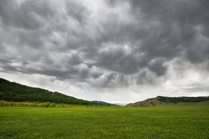 Brooding Skies In The Mongolias Wallpaper