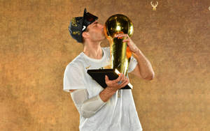 Brook Lopez With Trophy Portrait Wallpaper