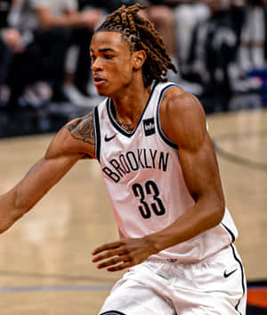 Brooklyn Basketball Player In Action Wallpaper