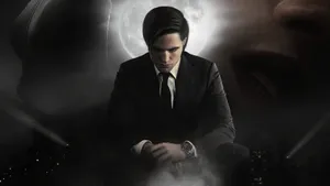 Bruce Wayne Striking A Confident Pose In Business Attire. Wallpaper