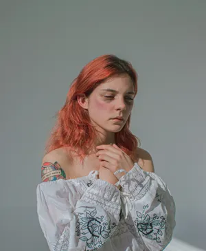 Bruised Redhead Girl Wallpaper