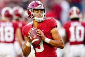 Bryce Young Alabama Quarterback Action Wallpaper