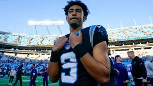 Bryce Young Panthers Jersey Field Wallpaper