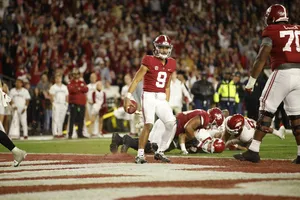 Bryce Young Quarterback Action Wallpaper