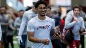 Bryce Young Smiling During Pro Day Event Wallpaper