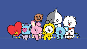 Bt21 Characters Sitting Playfully Wallpaper