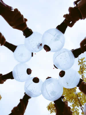 Bts Army Bomb Waving In A Sea Of Fans Wallpaper