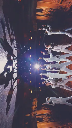 Bts At Their Best In A Stunning Music Video Scene Wallpaper