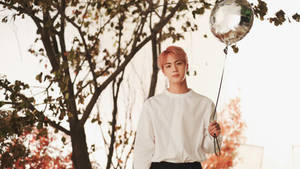 Bts Jin Holding A Balloon Wallpaper