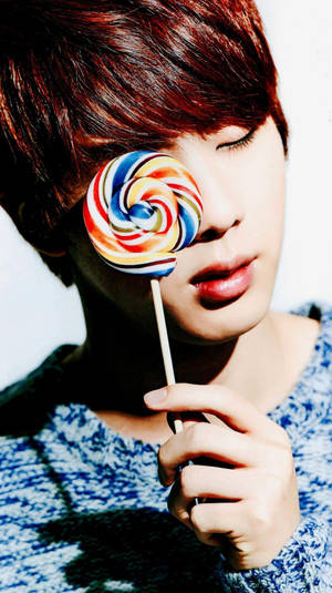 Bts Jin With Twirl Lollipop Wallpaper