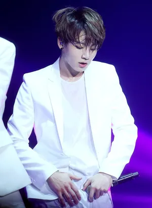 Bts Live In Action On Stage Wallpaper