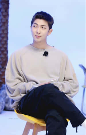 Bts Members Proudly Showcasing Endorsement Brands Wallpaper