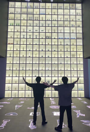 Bts Posing With Their Endorsement Product Wallpaper