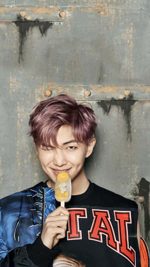 Bts Rap Monster In Mesmerizing Pose Wallpaper