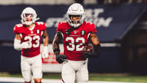 Budda Baker Cardinals Game Action Wallpaper