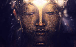 Buddha Statue In The Golden Glow Wallpaper