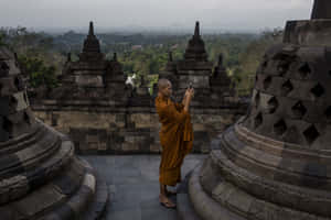 Buddhist Monk In Borobudur Temple Wallpaper