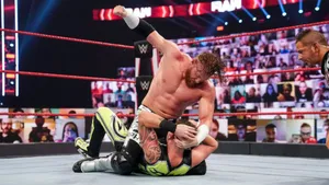 Buddy Murphy Vs. Seth Rollins Wwe Smackdown Wallpaper