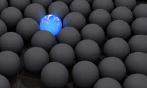 Bue Ball Amongst Several Black Spheres Wallpaper