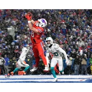 Buffalo Bills Player Catching Footballin Snow Wallpaper