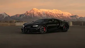 Bugatti Chiron Showcasing Its True Power And Elegance On The Road Wallpaper