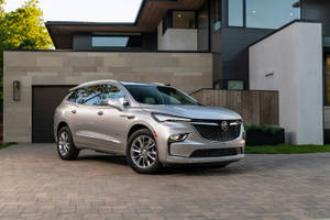 Buick Enclave Parked At A Home Garage Wallpaper