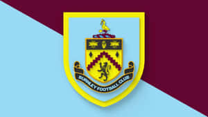 Burnley Fc Players Celebrating Victory On The Field Wallpaper