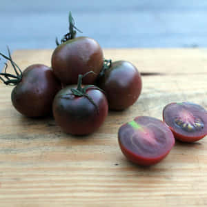 Bursting With Flavor - Enjoy A Fresh, Juicy Black Cherry! Wallpaper